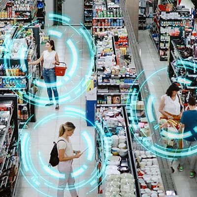 Overhead image of people buying in the large supermarket